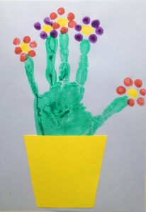 Imagen de huella de mano: maceta Imagen de huella de mano: maceta