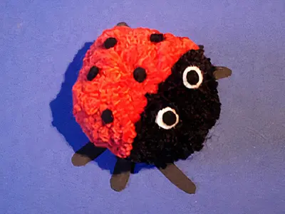 Mariquita con pompones Mariquita con pompones